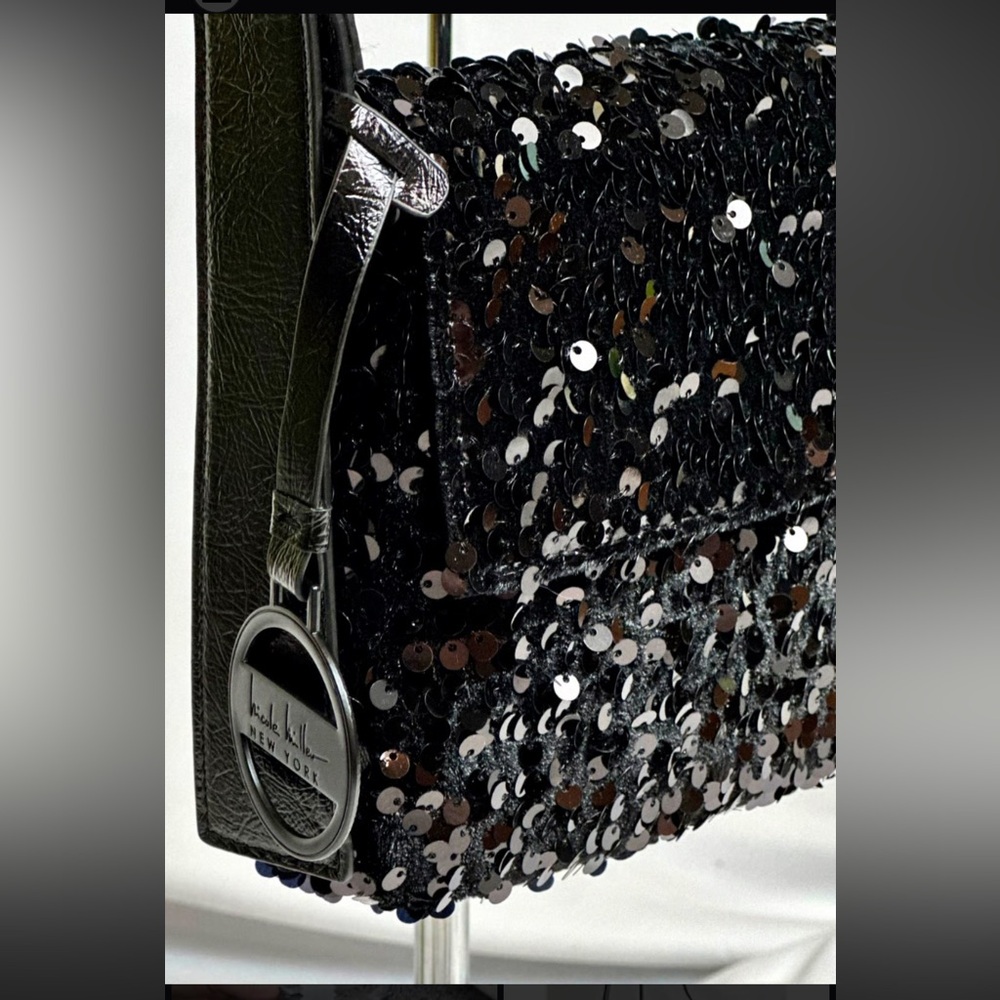 NWT Nicole Miller Black Sequin Wristlet/Purse with adjustable strap.